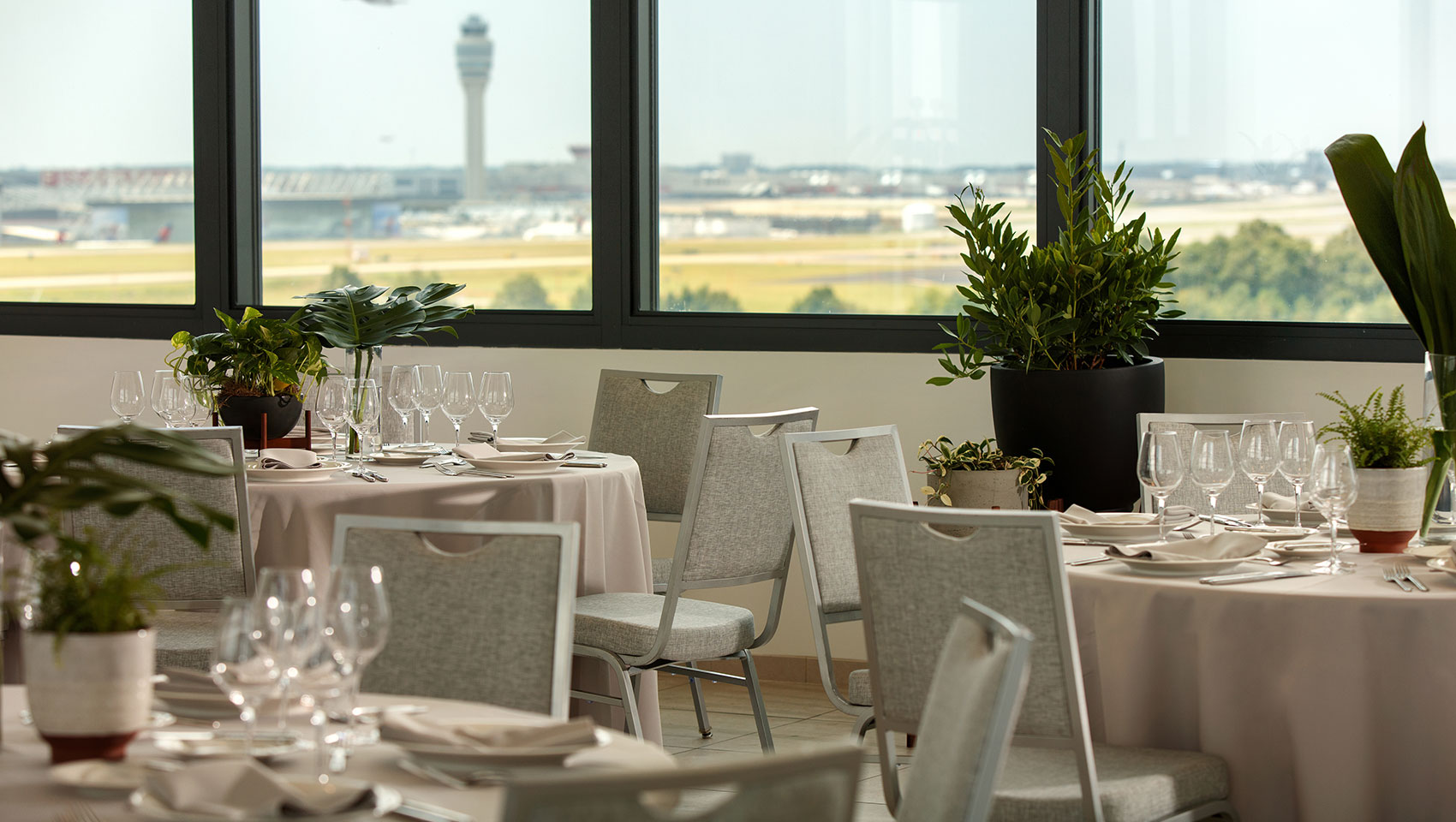 Bright Meeting Space with Airport Views